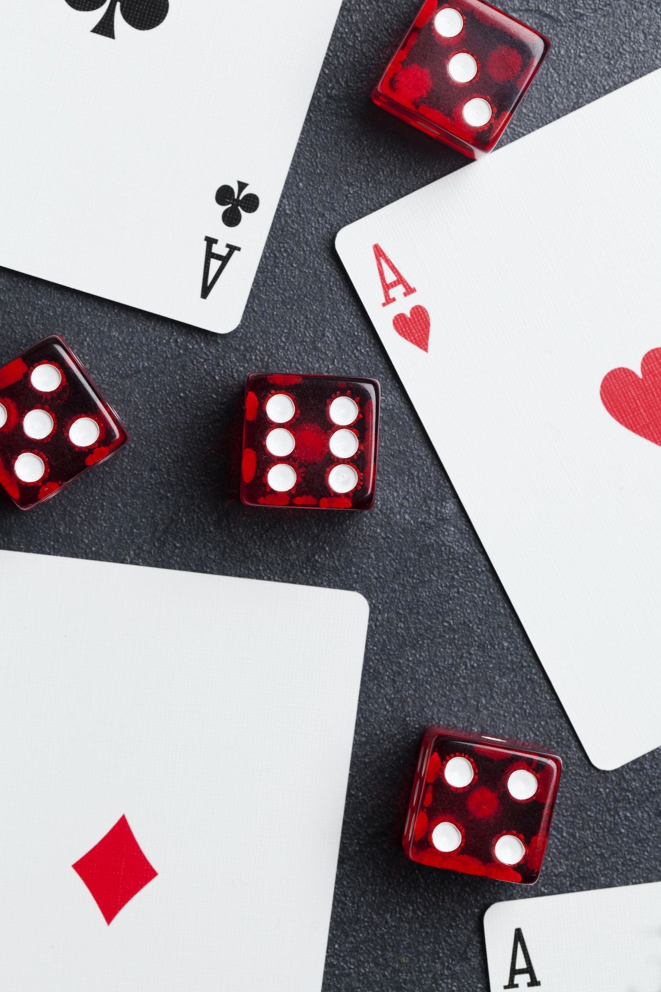 Ace playing cards with red dice. Casino betting and gambling concept