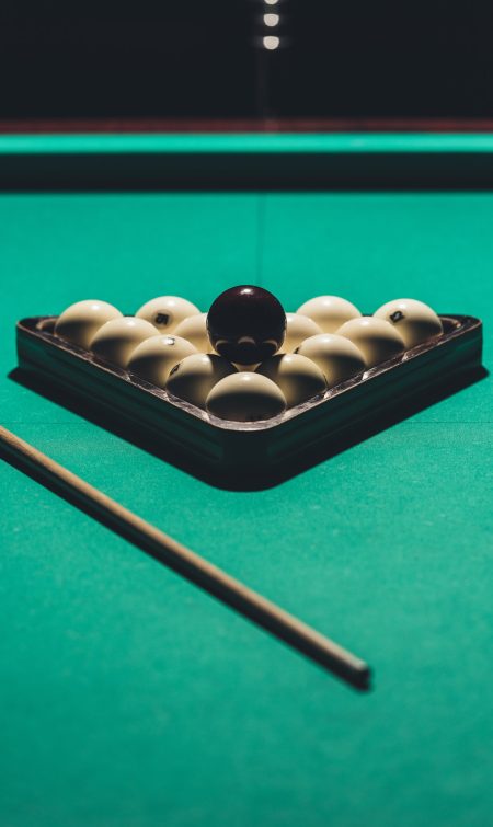 gambling table with russian billiard set and cue